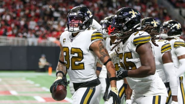 New Orleans Saints safety Tyrann Mathieu (32) celebrates with teammates after an interception